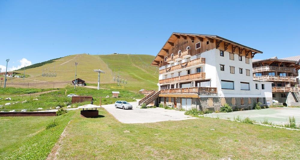 Madame Vacances Hotel Le Christina Alpe d'Huez Exterior photo